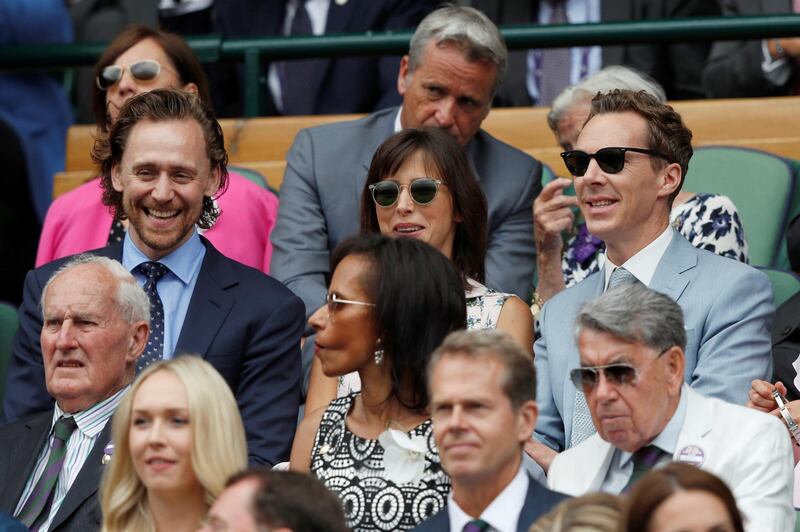 Actor Tom Hiddleston with Benedict Cumberbatch and his wife, Sophie Hunter, in the Royal Box during the final between Switzerland's Roger Federer and Serbia's Novak Djokovic Adrian Dennis/Pool via REUTERS