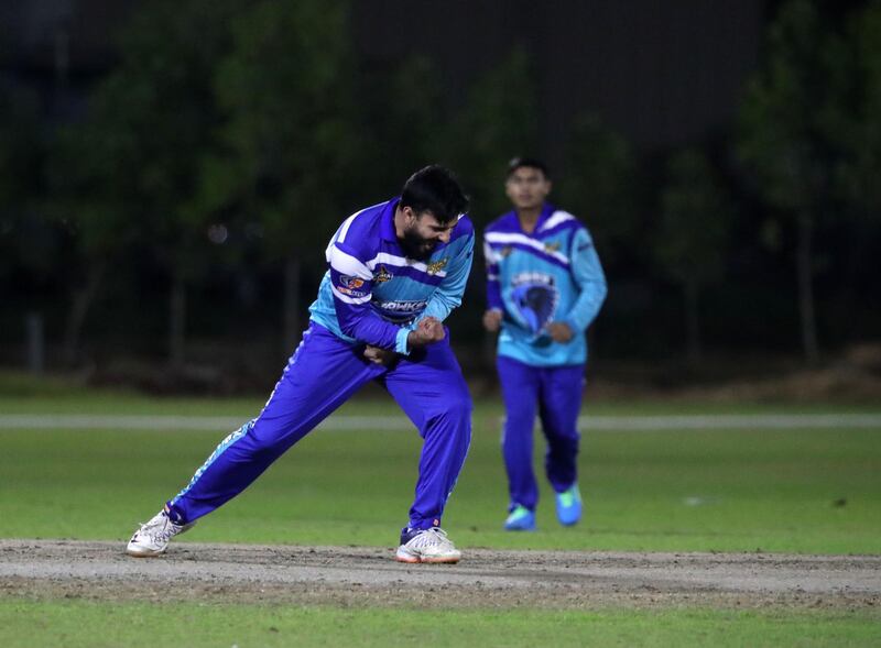 Ajman, United Arab Emirates - Reporter: Paul Radley. Sport. Cricket. Hawk's Umer Farooq takes the wicket of Lion's Abdullah Azhar. Hawks v Lions in the Karwan Rising Stars league. Ajman. Tuesday, January 19th, 2021. Chris Whiteoak / The National