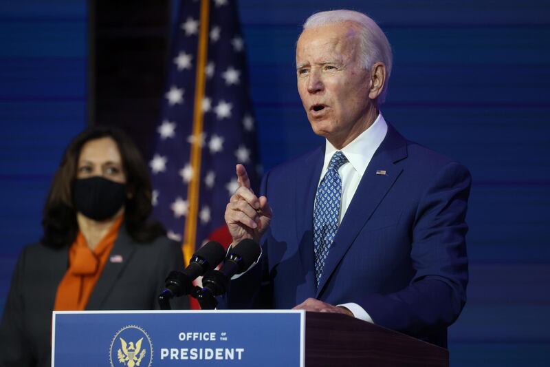 U.S. President-elect Joe Biden and Vice President-elect Kamala Harris address reporters about efforts to confront the coronavirus disease (COVID-19) pandemic after meeting with members of the "Transition COVID-19 Advisory Board" in Wilmington, Delaware, U.S., November 9, 2020. REUTERS/Jonathan Ernst