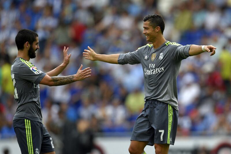 Cristiano Ronaldo celebrates with teammate Isco after scoring for Real Madrid in a La Liga game at Espanyol on September 12, 2015. AFP