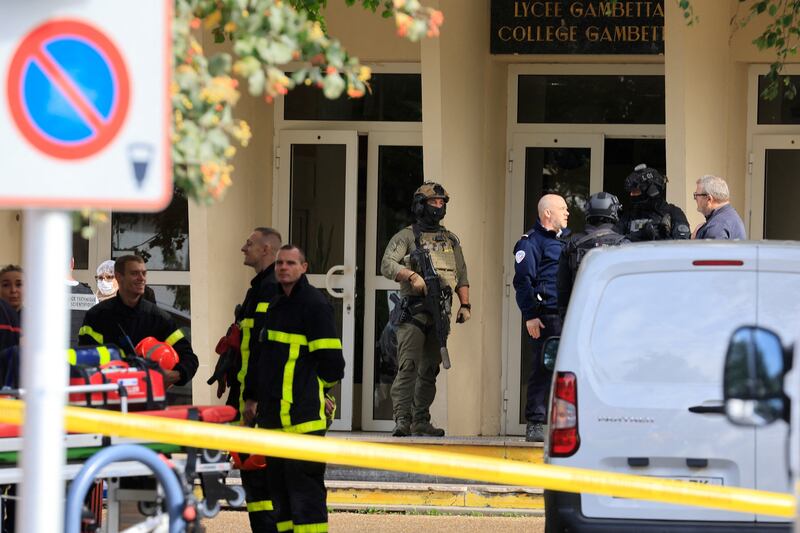 French police, soldiers and firefighters at Gambetta high school in Arras after a teacher was killed and three others injured in a knife attack on Friday. Reuters