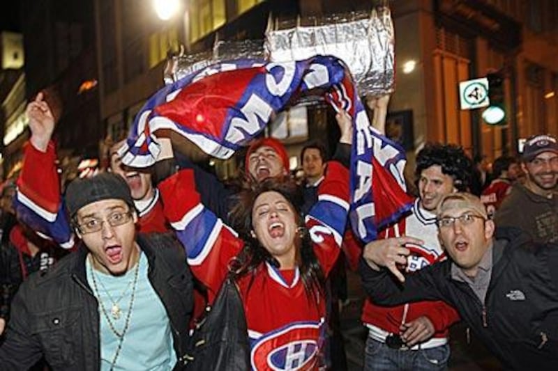 Canadiens fans take to the streets to celebrate a victory over the Penguins in the Eastern Conference semi-final.