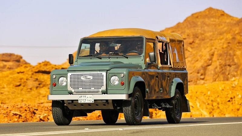 Head into the desert in a vintage Land Rover for a tour of ancient Hegra. Photo: Visit AlUla