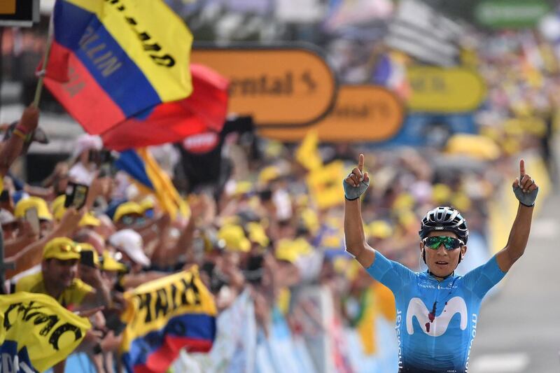 Colombia's Nairo Quintana celebrates after winning the 18th stage, on July 25, 2019. AFP
