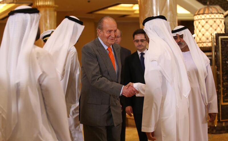 UAE officials welcome King Juan Carlos, centre,  at the UAE-Spain Economic Forum at the Emirates Palace hotel in Abu Dhabi. Ali Haider / EPA