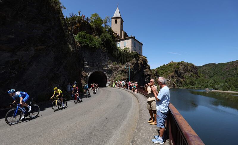 Jumbo-Visma's Jonas Vingegaard, wearing the overall leader's yellow jersey, during Stage 15. AFP