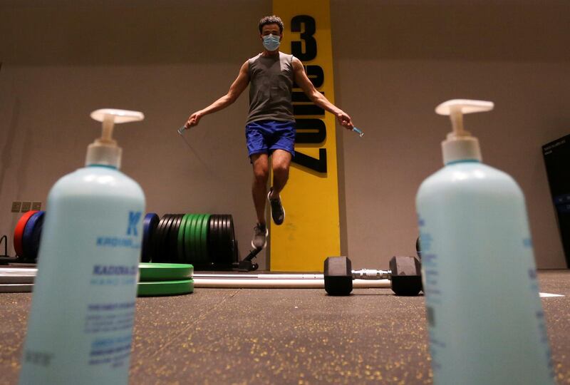 A Saudi man wearing a protective face mask exercises at a gym in Riyadh. Reuters