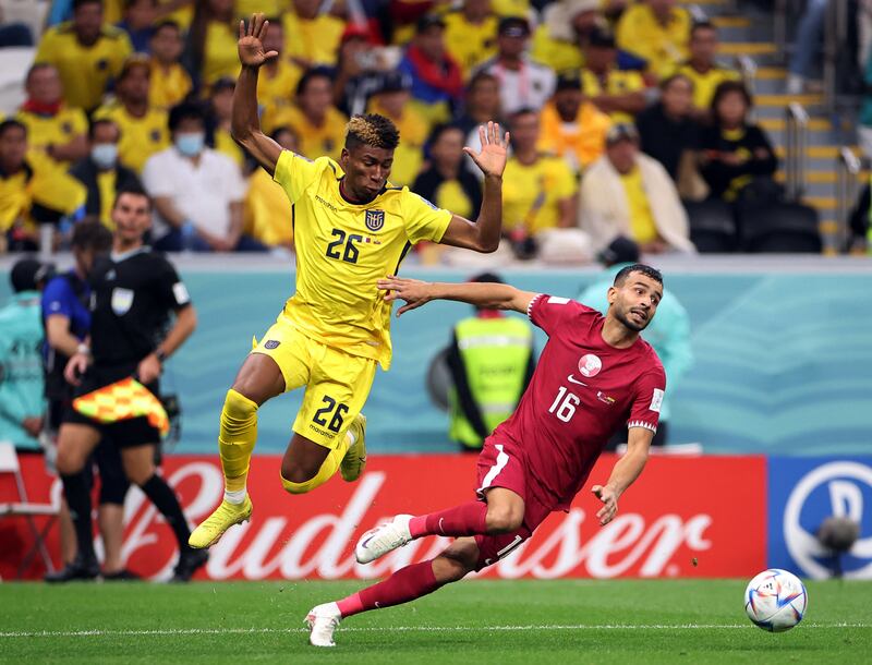 Khoukhi in action with Ecuador's Kevin Rodriguez. Reuters