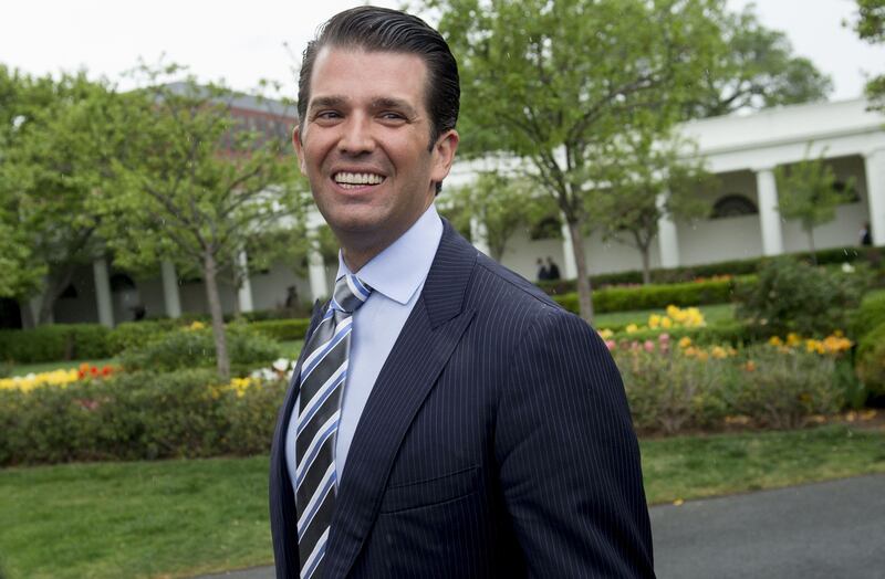 (FILES) This file photo taken on April 17, 2017 shows Donald Trump, Jr., son of US President Donald Trump, attending the 139th White House Easter Egg Roll on the South Lawn of the White House in Washington, DC.
Donald Trump Jr set off a sour reaction on Twitter with a Halloween tweet in which he joked he'll teach his three-year-old daughter about socialism by taking away half her candy. "I'm going to take half of Chloe's candy tonight & give it to some kid who sat at home. It's never to early to teach her about socialism," the US president's son posted, along with a picture with a bucket of treats. The message didn't go over well on Twitter, unleashing a cascade of mostly negative comments.
 / AFP PHOTO / SAUL LOEB