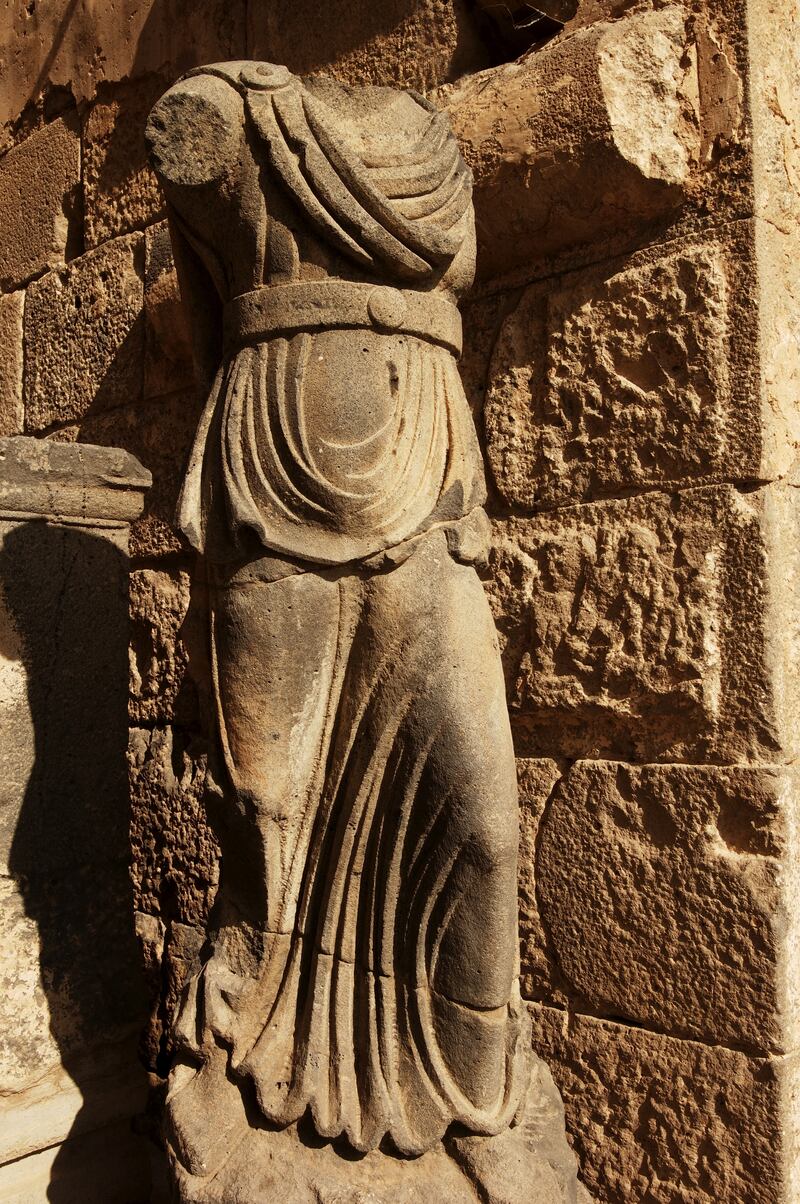 A 2nd-century Roman amphitheatre in Bosra, Syria has been declared a Unesco World Heritage Site but suffered damage during the country's civil war.