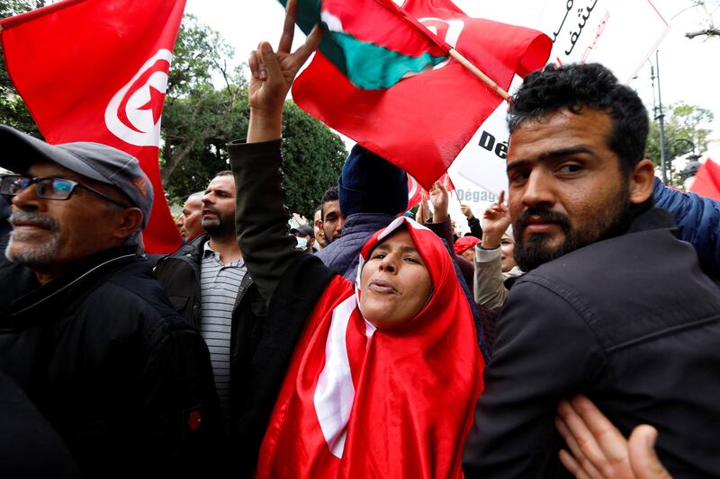 "Saied get out!" chanted protesters marching in the centre of Tunis. Reuters