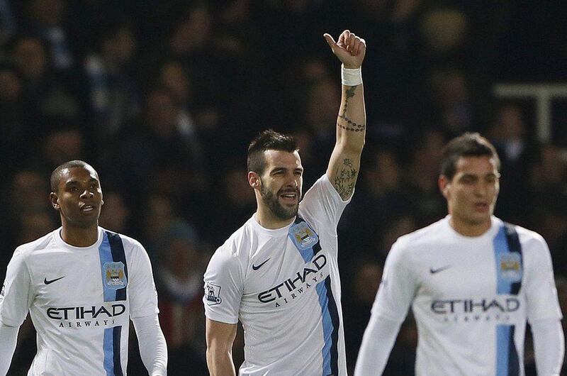 Alvaro Negredo, centre, scored twice for Manchester City on Tuesday. Stefan Wermuth / Reuters