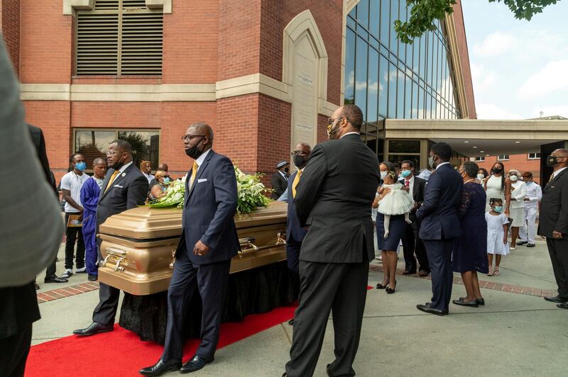 The coffin of Rayshard Brooks is carried to the hearse after his funeral. Reuters