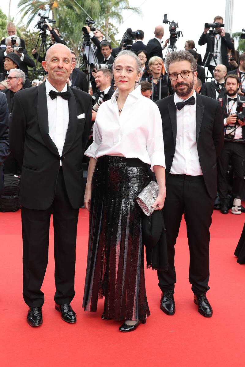 Keeping things simple, Delphine Ernotte, centre, wears white shirt and shredded black skirt. Getty