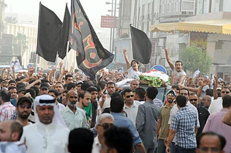 Bahrainis take to the streets in Manama after a protester died this week from rubber bullet injuries suffered earlier.