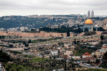 This picture taken on February 10, 2020 shows a view of the Dome of the Rock (R) and al-Aqsa mosque (C), both within the area known as al-Aqsa mosque compound to Muslims and the Temple Mount to Jews, in Jerusalem on a stormy day AFP