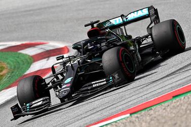 Mercedes' British driver Lewis Hamilton steers his car during the Formula One Styrian Grand Prix race on July 12, 2020 in Spielberg, Austria. / AFP / POOL / Joe Klamar