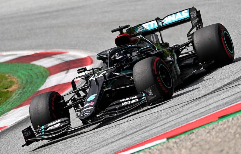 Mercedes' British driver Lewis Hamilton steers his car during the Formula One Styrian Grand Prix race on July 12, 2020 in Spielberg, Austria.  / AFP / POOL / Joe Klamar
