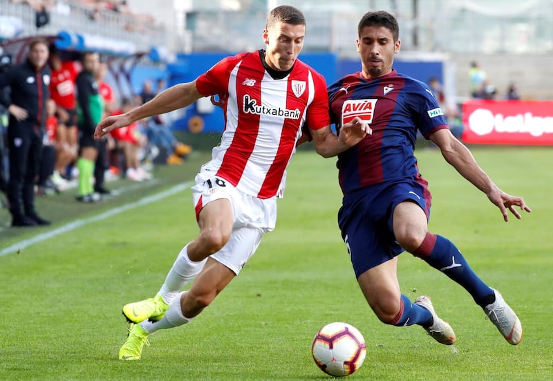 Athletic Bilbao's defender Oscar de Marcos in action against Eibar's Jose Angel Valdes. EPA