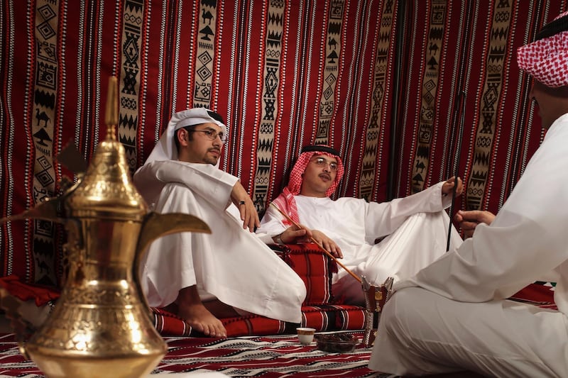 Arab men on a tea session. Getty Images