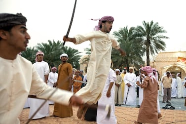What might Sheikh Hamdan's Dubai wedding look like? Many weddings follow a similar formula, but vary between regions and family. Pictured in Ras al Khaimah, a teenager leaps into the air with his sword as part of a traditional dance called the razif. Jeff Topping / The National