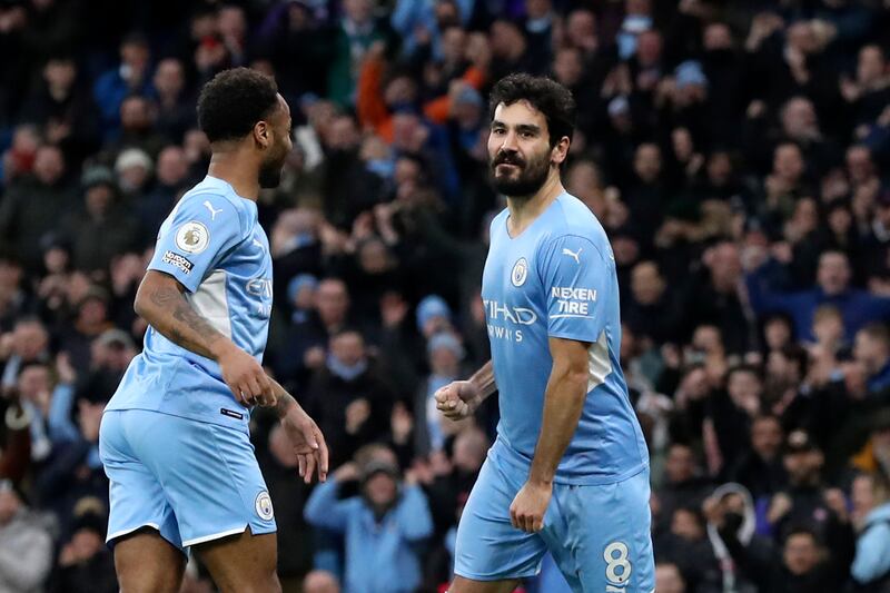 Ilkay Gundogan, right, with Manchester City's Raheem Sterling at the Etihad Stadium. AP