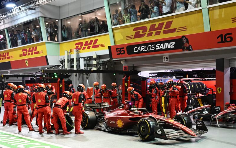 Ferrari's Charles Leclerc makes a pit stop at the Marina Bay Street Circuit. EPA