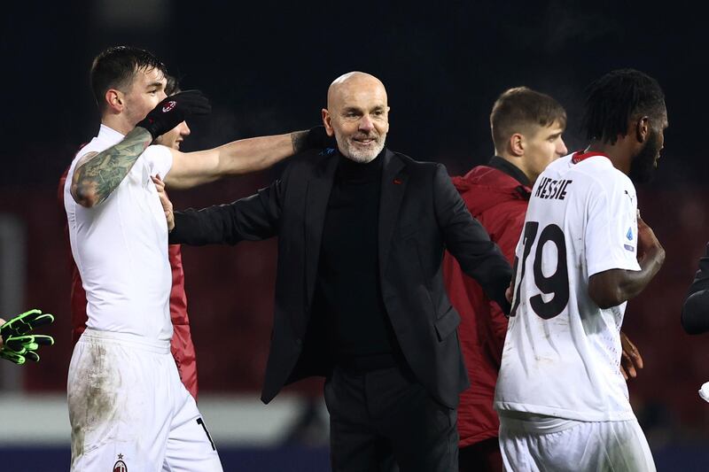 Milan manager Stefano Pioli celebrates after the match. AP