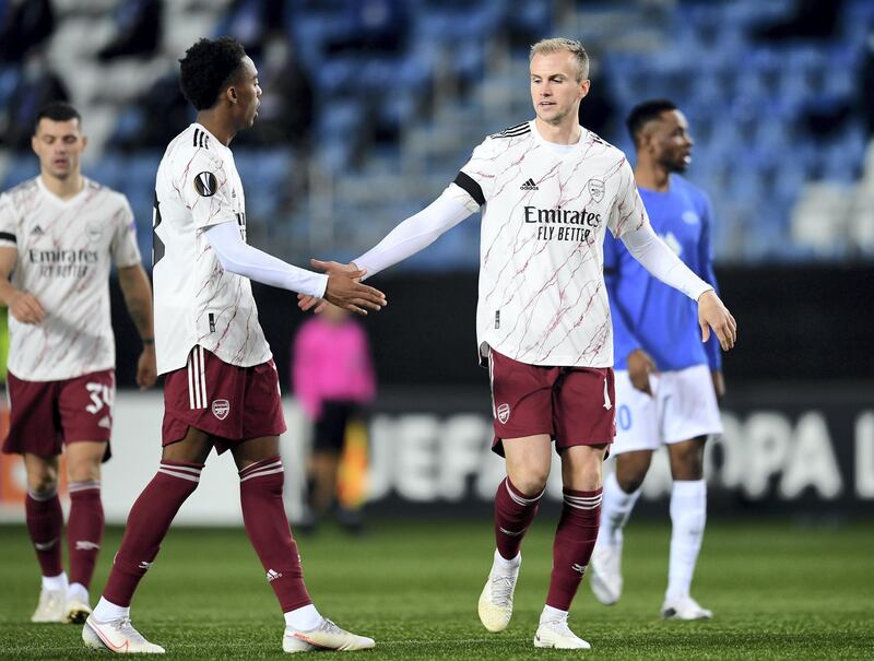 MOLDE, NORWAY - NOVEMBER 26: Joe Willock and Rob Holding of Arsenal during the UEFA Europa League Group B stage match between Molde FK and Arsenal FC at Molde Stadion on November 26, 2020 in Molde, Norway. (Photo by David Price/Arsenal FC via Getty Images)
