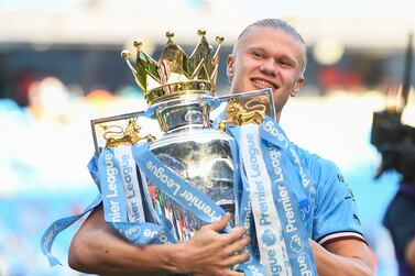 Erling Haaland of Manchester City celebrates with the English Premier League trophy after  the English Premier League match between Manchester City and Chelsea FC in Manchester, Britain, 21 May 2023.   EPA/PETER POWELL EDITORIAL USE ONLY.  No use with unauthorized audio, video, data, fixture lists, club/league logos or 'live' services.  Online in-match use limited to 120 images, no video emulation.  No use in betting, games or single club/league/player publications. 