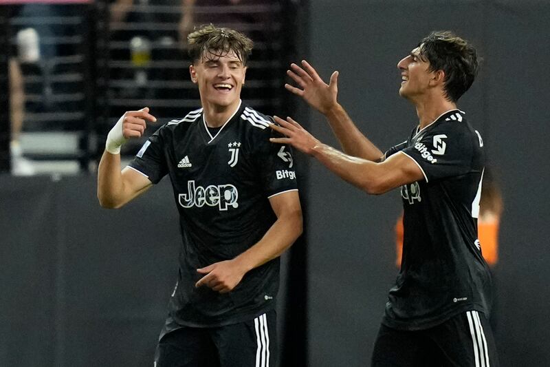 Juventus' Tommaso Barbieri, right, celebrates after Mattia Compagnon, left, scored against Chivas on Friday. AP
