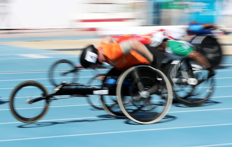 DUBAI, UNITED ARAB EMIRATES , Nov 7  – 2019 :- Athletes participating in the men’s 100m T54 round 1 heat 4 during the Dubai 2019 World Para Athletics Championship held at Dubai Club For People Of Determination in Dubai. ( Pawan Singh / The National )  For New. Story by Ramola