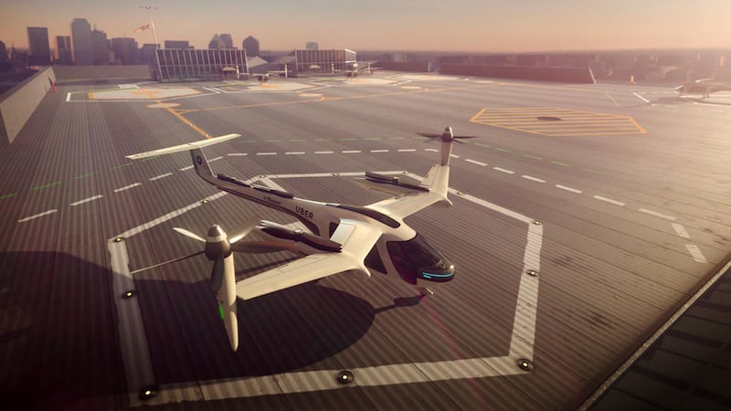 This computer generated image provided by Uber Technologies on Wednesday, Nov. 8, 2017 shows a flying taxi by Uber. Commuters of the future could get some relief from congested roads if Uber's plans for flying taxis work out. The ride-hailing service has unveiled an artist's impression of the sleek, futuristic machine it hopes to start using for demonstration flights in 2020 and deploy for ride-sharing by 2028. (Uber Technologies via AP)