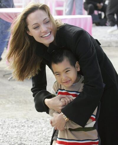 Angelina Jolie adopted Maddox in 2002. AP