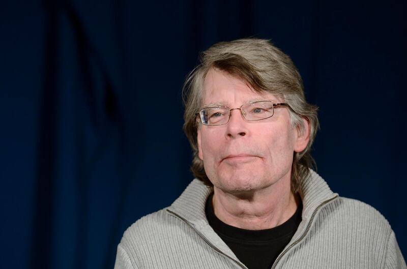 Stephen King poses for photographers as he arrives for a press conference dedicated to presenting his new book "Doctor Sleep" on November 12, 2013, in Paris. AFP PHOTO / ERIC FEFERBERG / AFP PHOTO / ERIC FEFERBERG