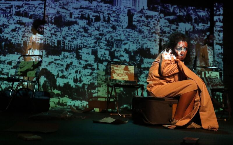 Syrian  actress Rasha Alzoghbi performs during the 'Bawabat' (Gates) play at Al Qabani theatre in Damascus, Syria.  EPA