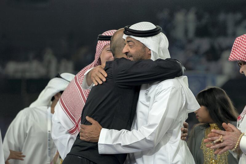 AL AIN, UNITED ARAB EMIRATES - April 18, 2019: HH Sheikh Mohamed bin Zayed Al Nahyan Crown Prince of Abu Dhabi Deputy Supreme Commander of the UAE Armed Forces (R) greets a participant during the 2018–19 Zayed Champions Cup final football match between Al Hilal and Etoile du Sahel, at Hazza bin Zayed Stadium.

( Mohamed Al Hammadi / Ministry of Presidential Affairs )
---