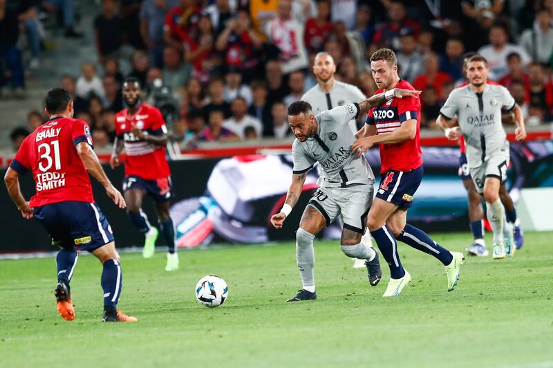 Paris Saint-Germain's Neymar and Lille's Ismaily Goncalves Santos in action. EPA