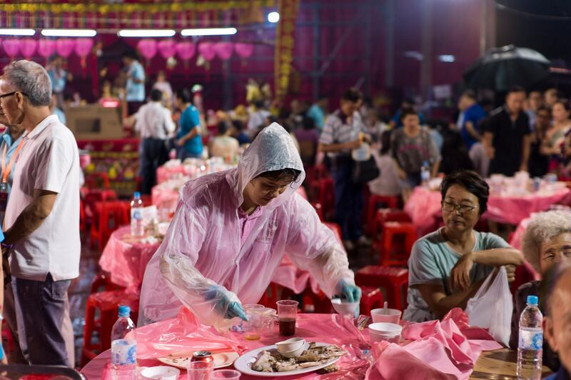 Guests attend a banquet held during the performance. EPA