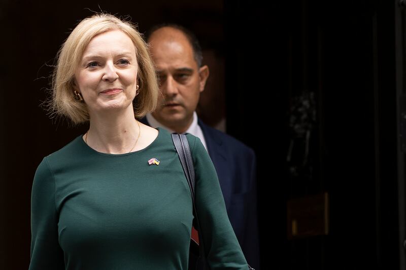 UK Prime Minister Liz Truss leaves 10 Downing Street to announce her plan on capping energy bills in the House of Commons. Getty Images