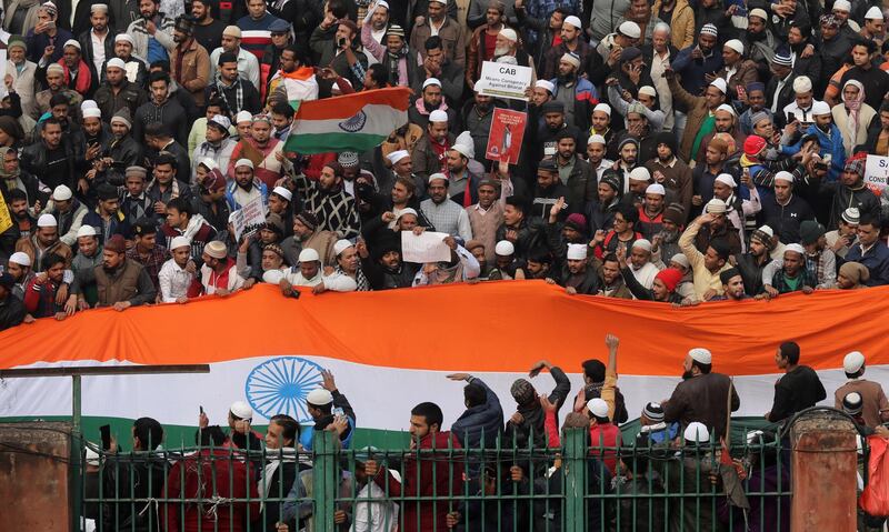 Indian Muslim activists along with others shout slogans during a protest against the Citizenship Amendment Act 2019 (CAA) outside Jama Mosque, in New Delhi, India, 20 December 2019.  EPA/RAJAT GUPTA