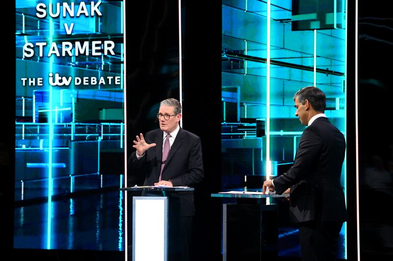 Mr Sunak and Mr Starmer lock horns the first televised general election debate of the campaign, at MediaCity in Salford. PA