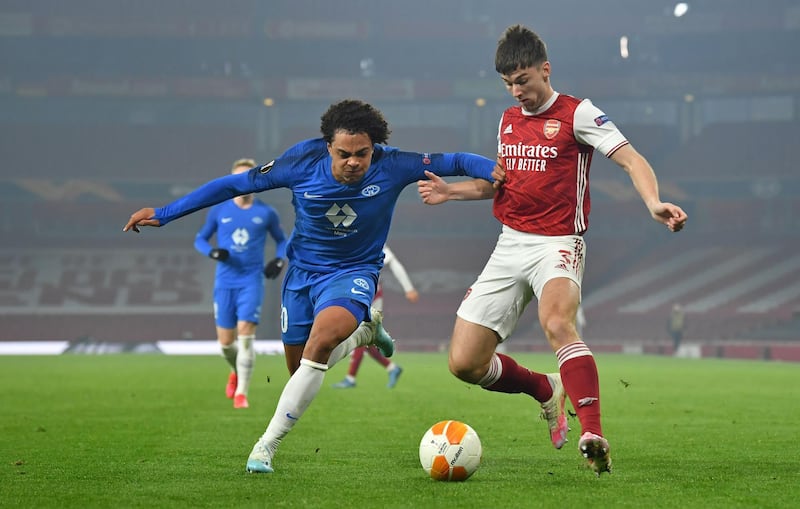 Arsenal's defender Kieran Tierney vies for the ball with Molde's Henry Wingo. AFP