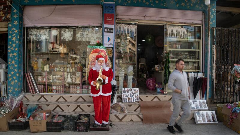 Shopfront that sells Christmas decorations in the town of Hamdaniya, Mosul. Haider Husseini