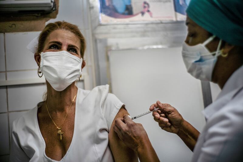 A dose of the Soberana-02 coronavirus vaccine is given to a health worker during trial in March 2021. Reuters