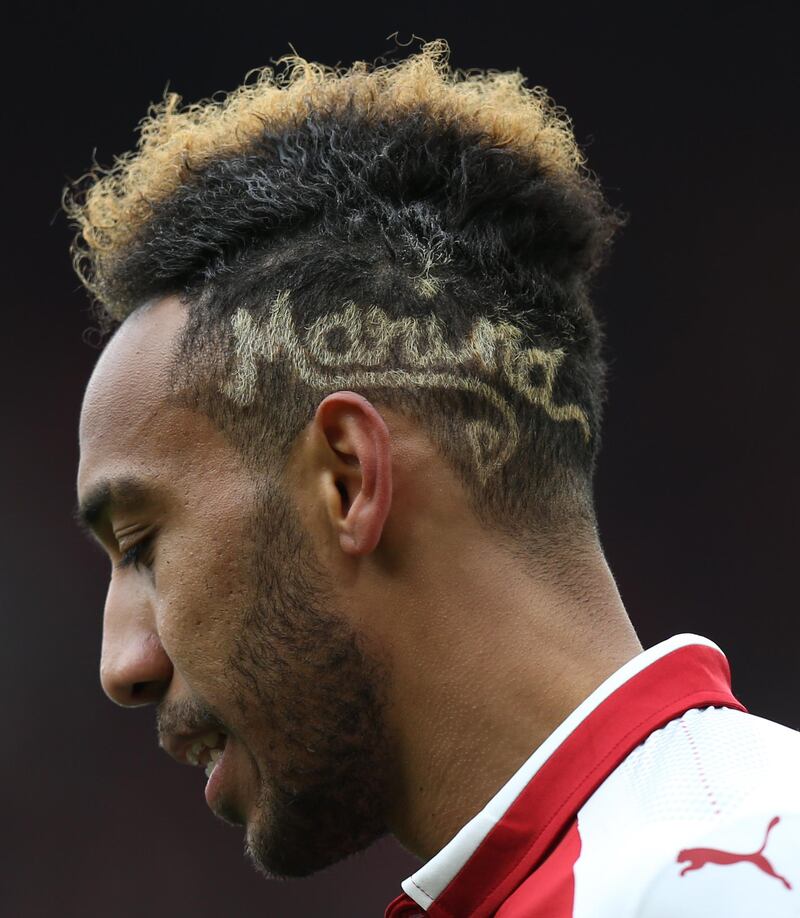 LONDON, ENGLAND - APRIL 01: Pierre-Emerick Aubameyang of Arsenal with the name Marina shaved into his hair during the Premier League match between Arsenal and Stoke City at Emirates Stadium on April 1, 2018 in London, England. (Photo by Mark Leech/Offside via Getty Images)
