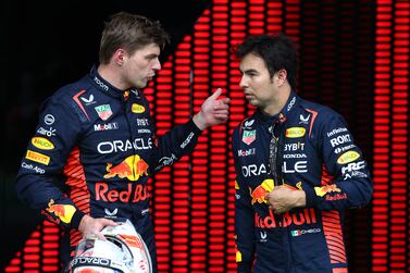 SPIELBERG, AUSTRIA - JULY 01: Sprint winner Max Verstappen of the Netherlands and Oracle Red Bull Racing and Second placed Sergio Perez of Mexico and Oracle Red Bull Racing talk in parc ferme during the Sprint ahead of the F1 Grand Prix of Austria at Red Bull Ring on July 01, 2023 in Spielberg, Austria. (Photo by Clive Rose / Getty Images)