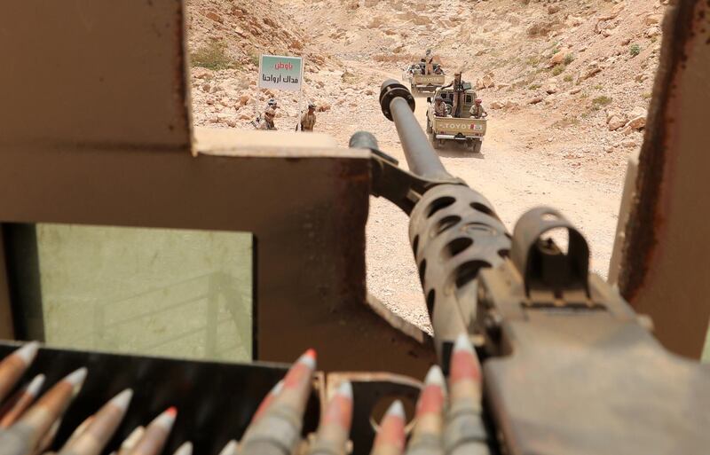 Yemeni soldiers loyal to the Saudi and UAE-backed government riding armed pickups through a mountain road north of the southeastern city of Mukalla. AFP