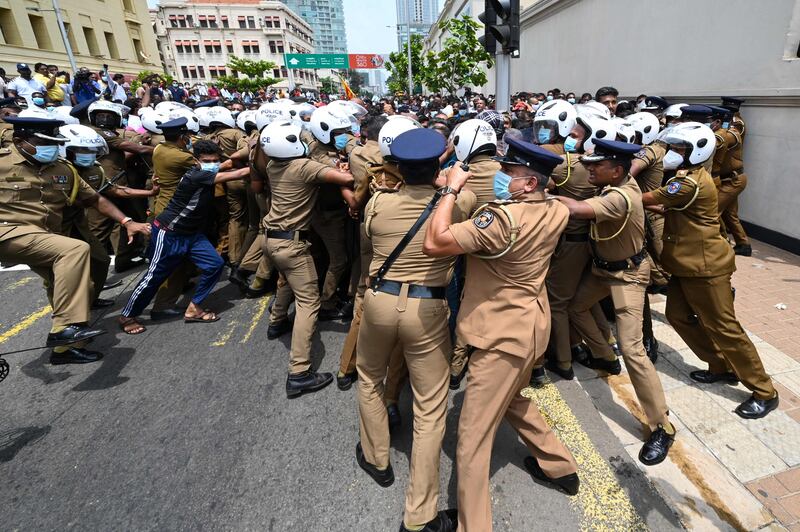 Violence raged across Sri Lanka late into the night on Monday, with five people dead and some 180 injured. AFP