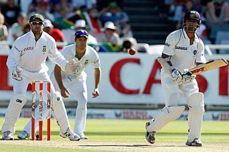 India's Gautam Gambhir, right, plays a shot during the third Test against South Africa in Cape Town.